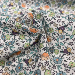 Voile di cotone Bio, Bianco con Fiori Celesti, Arancioni e Gialli e Foglie Verdi