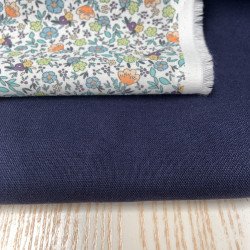 Voile di cotone Bio, Bianco con Fiori Celesti, Arancioni e Gialli e Foglie Verdi
