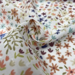 Plumeti Cotton con ricamo in rilevo , base Bianca con fiorellini colorati