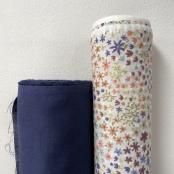 Plumeti Cotton con ricamo in rilevo , base Bianca con fiorellini colorati