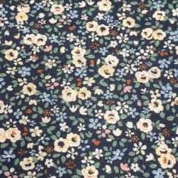 Cotone Popeline, Base Blu con Fiori Ocra  e foglie Verdi