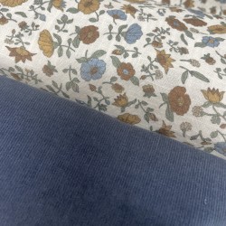 Cotone con stampa di fiori ocra e turchesi.